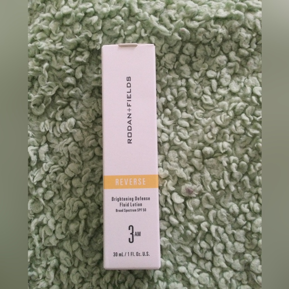 Rodan & fields Reverse Brightening Defense Fluid lotion